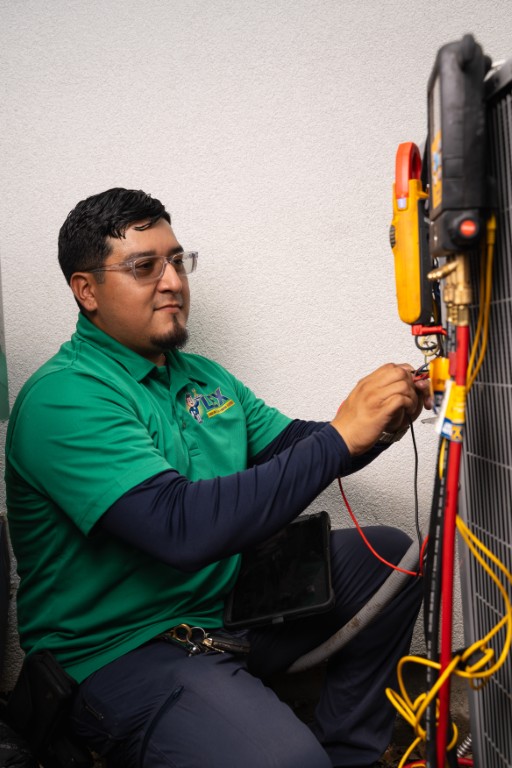 LEX AC Repair technician with service truck