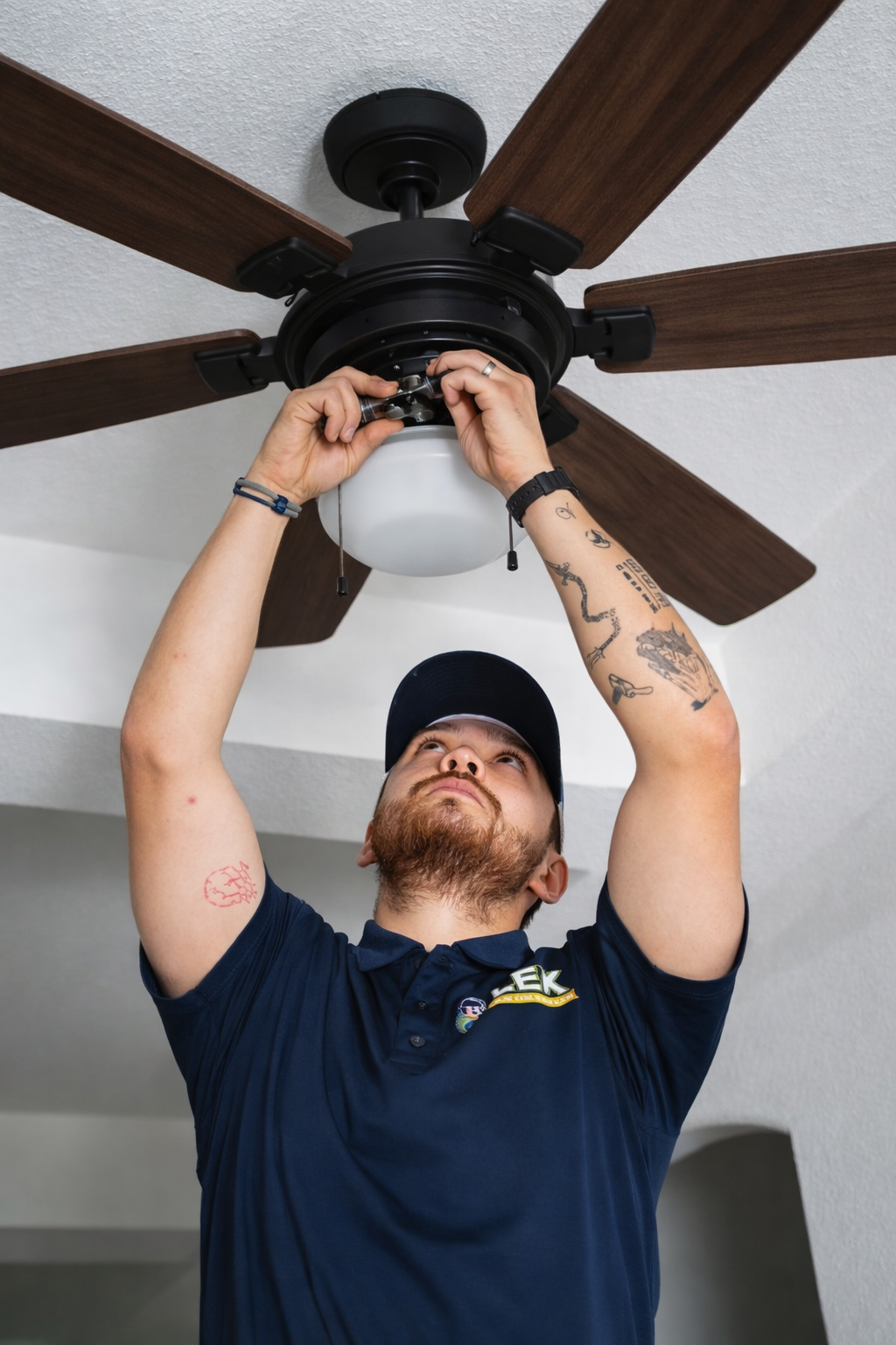 LEX electrician installing ceiling fan
