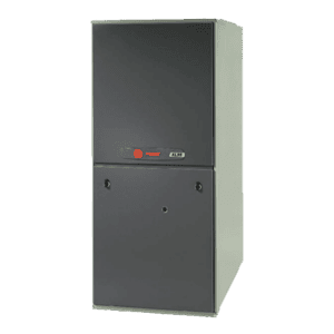 A gray, rectangular Trane HVAC furnace unit with a flat front panel and Trane branding near the center, standing on a plain white background.