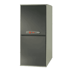 A gray, rectangular Trane gas furnace with a closed front panel, standing on a plain white background.